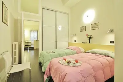 Letto o letti in una camera di Malespini by Halldis