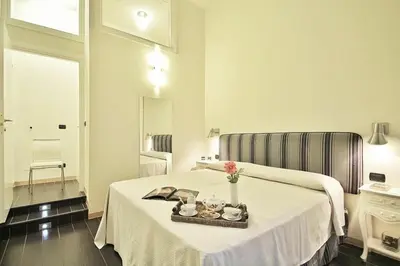 Letto o letti in una camera di Malespini by Halldis