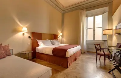 Letto o letti in una camera di Santa Croce 14 B&B