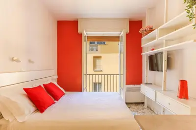 Letto o letti in una camera di The Red Loft in Ponte Vecchio