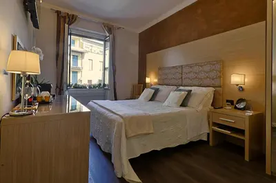 Letto o letti in una camera di Residenza Ponte Vecchio Firenze