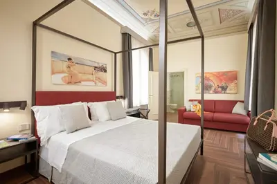 Letto o letti in una camera di Residenza Mondragone