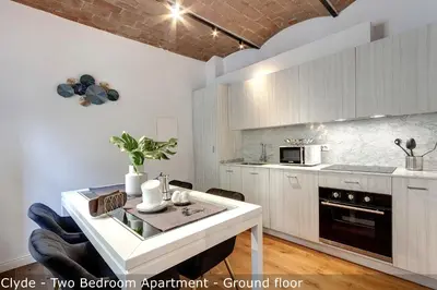 Cucina o angolo cottura di Bonnie - Clyde - Marvin Apartments by Mamo Florence