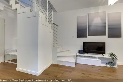 TV o dispositivi per l'intrattenimento presso Bonnie - Clyde - Marvin Apartments by Mamo Florence
