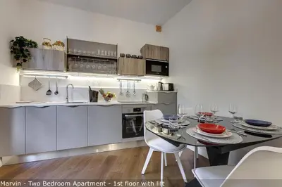 Cucina o angolo cottura di Bonnie - Clyde - Marvin Apartments by Mamo Florence