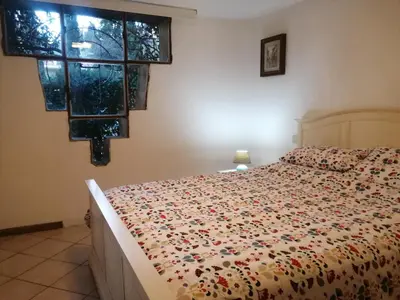 Letto o letti in una camera di La casa di Duccio con parcheggio gratuito