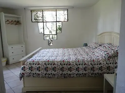 Letto o letti in una camera di La casa di Duccio con parcheggio gratuito