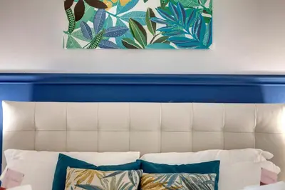 Letto o letti in una camera di Corinne Apartment by Mamo Florence
