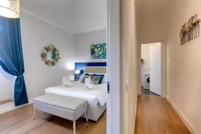 Letto o letti in una camera di Corinne Apartment by Mamo Florence