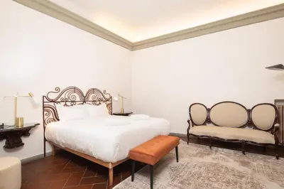 Letto o letti in una camera di Bardini Garden Apartment