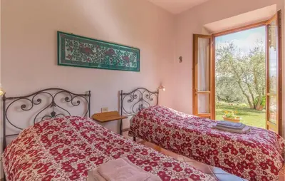 Letto o letti in una camera di Tiglio