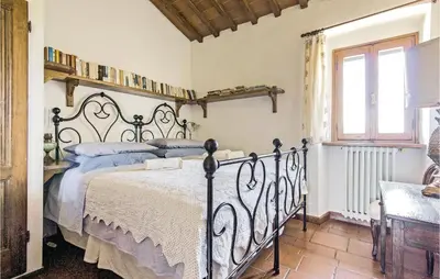 Letto o letti in una camera di Tutignano