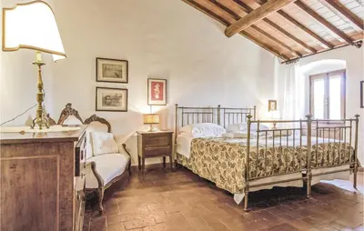Letto o letti in una camera di Tutignano