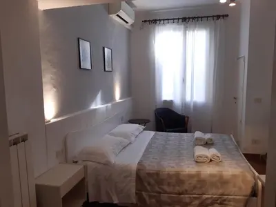 Letto o letti in una camera di case de' neri