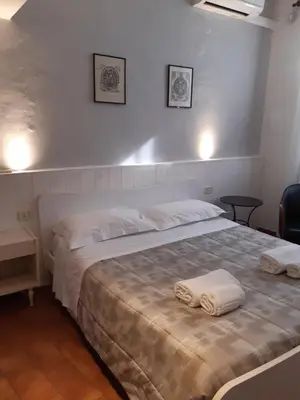 Letto o letti in una camera di case de' neri
