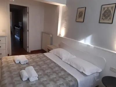 Letto o letti in una camera di case de' neri