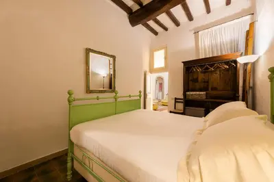 Letto o letti in una camera di Velluti by Mmega