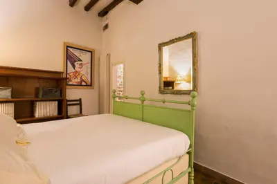 Letto o letti in una camera di Velluti by Mmega