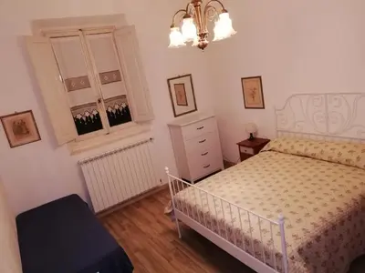 Letto o letti in una camera di Appartamento Aurora