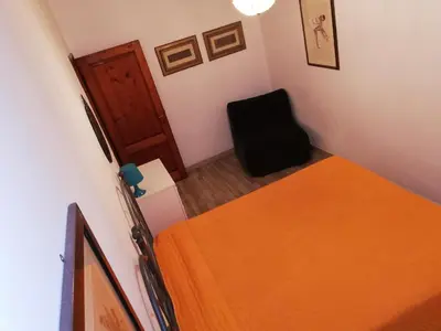 Letto o letti in una camera di Appartamento Aurora