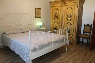 Letto o letti in una camera di Appartamento Aurora