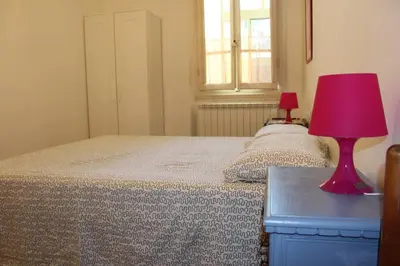 Letto o letti in una camera di Appartamento Aurora