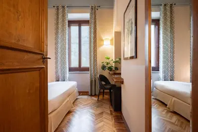 Letto o letti in una camera di Guest House Morandi