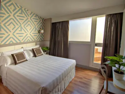 Letto o letti in una camera di Hotel Golf