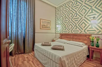 Letto o letti in una camera di Hotel Golf
