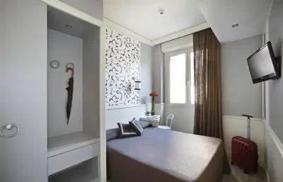 Letto o letti in una camera di Hotel Golf