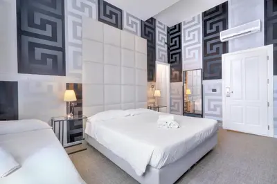 Letto o letti in una camera di Hotel Argentina
