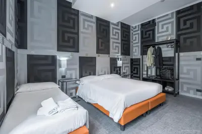 Letto o letti in una camera di Hotel Argentina