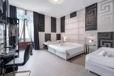 Letto o letti in una camera di Hotel Argentina