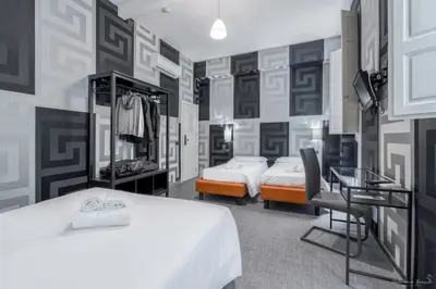 Letto o letti in una camera di Hotel Argentina
