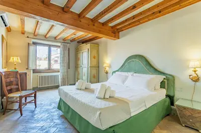 Letto o letti in una camera di Duomo Vigna Nuova by Halldis