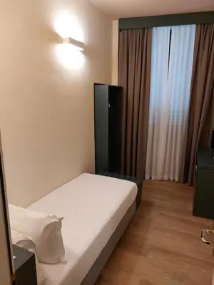 Letto o letti in una camera di Hotel Fiorita