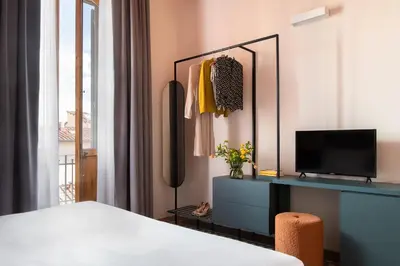Letto o letti in una camera di Hotel Fiorita