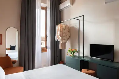 Letto o letti in una camera di Hotel Fiorita