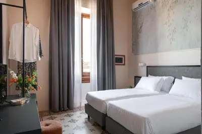 Letto o letti in una camera di Hotel Fiorita