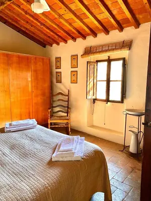 Letto o letti in una camera di Winery Houses in Chianti