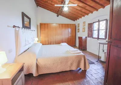 Letto o letti in una camera di Winery Houses in Chianti