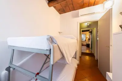 Letto o letti in una camera di Canacci by Mmega