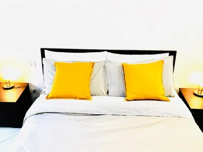 Letto o letti in una camera di Brand new apartment