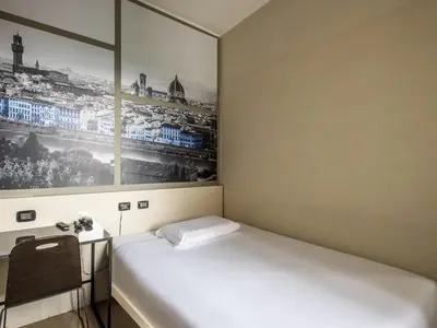 Letto o letti in una camera di B&B Hotel Firenze Novoli