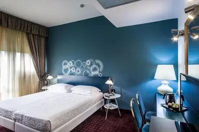 Letto o letti in una camera di Hotel Mirage