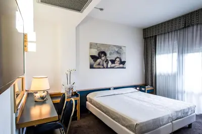 Letto o letti in una camera di Hotel Mirage