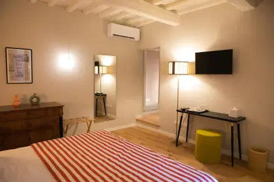 Letto o letti in una camera di Lunaria Suites - Fyodor Dostoyevsky's house