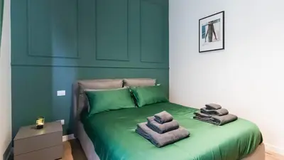 Letto o letti in una camera di Cavour 82