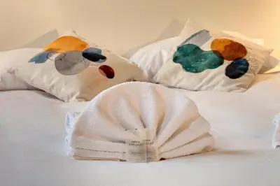 Letto o letti in una camera di Servi Apartment by Mamo Florence