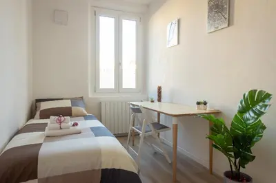 Letto o letti in una camera di Mosse Leopolda Apartment by Mamo Florence